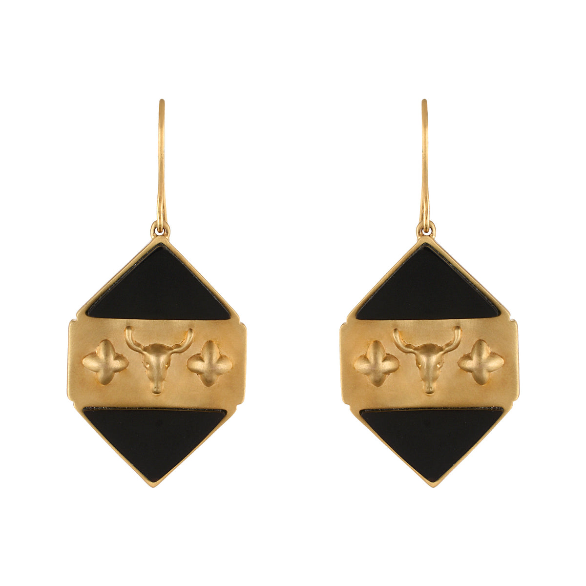 Gold and black earrings on a white background