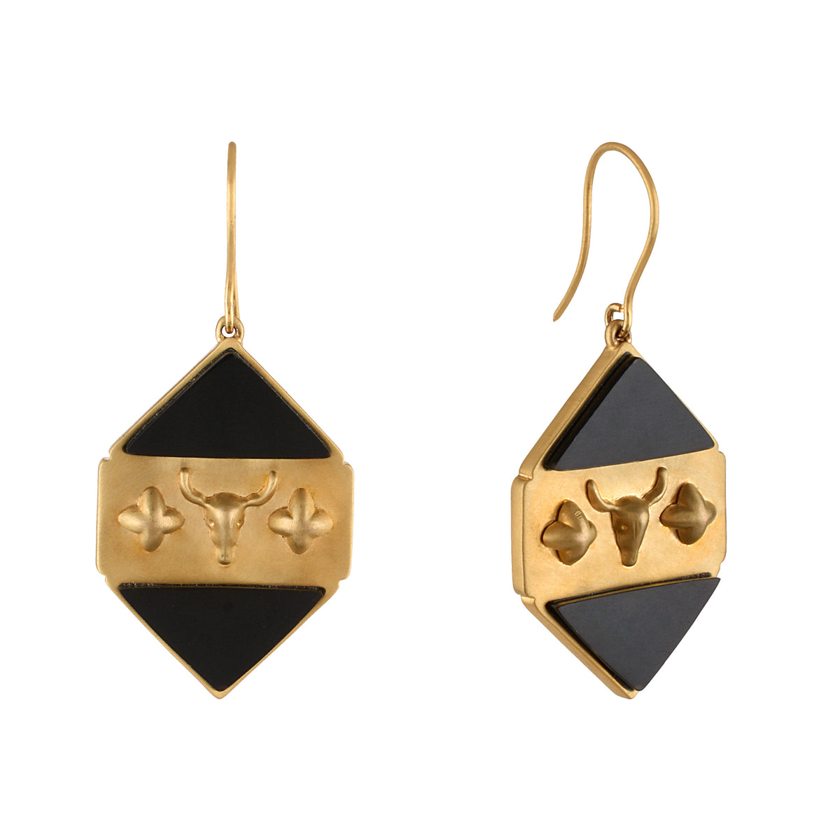 Gold and black earrings on a white background