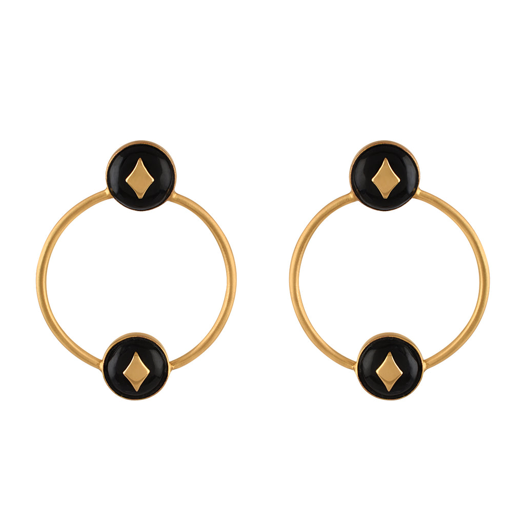 Pair of gold hoop earrings with black circular centers and gold accents on a white background