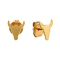 Gold bull head earrings on a white background