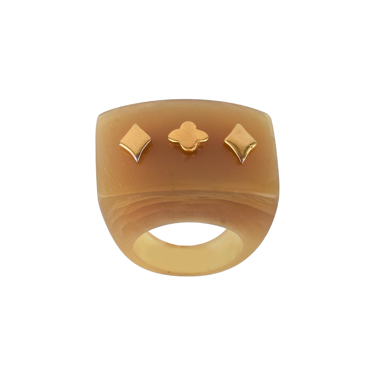 Buffalo horn ring with geometric designs on a white background