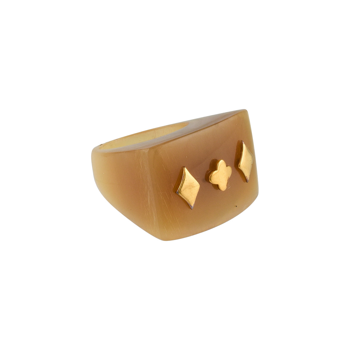 Buffalo horn ring with geometric designs on a white background.