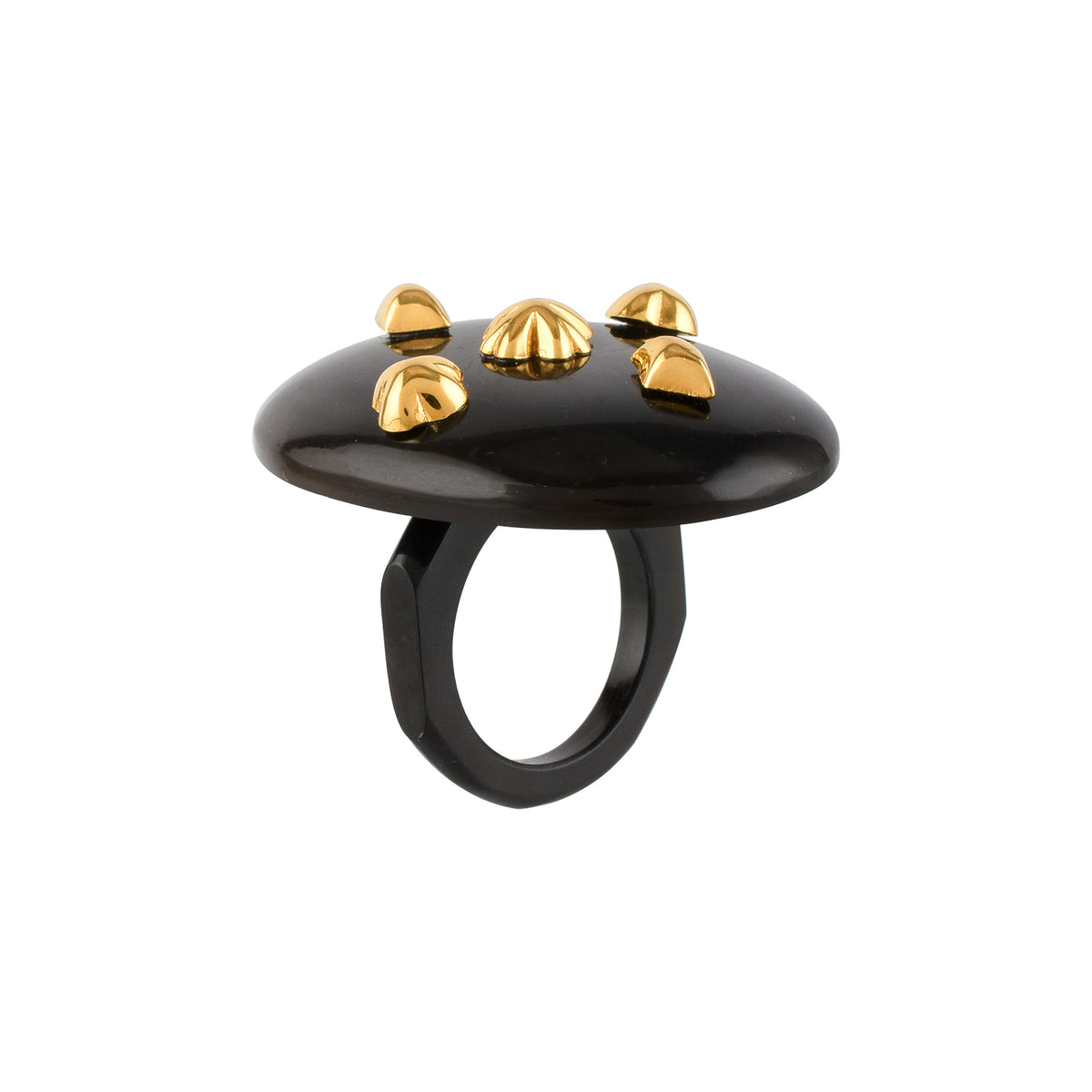 Black ring with gold studs on a white background