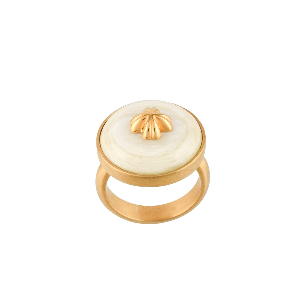 Gold ring with a white buffalo horn material and gold accent on a white background