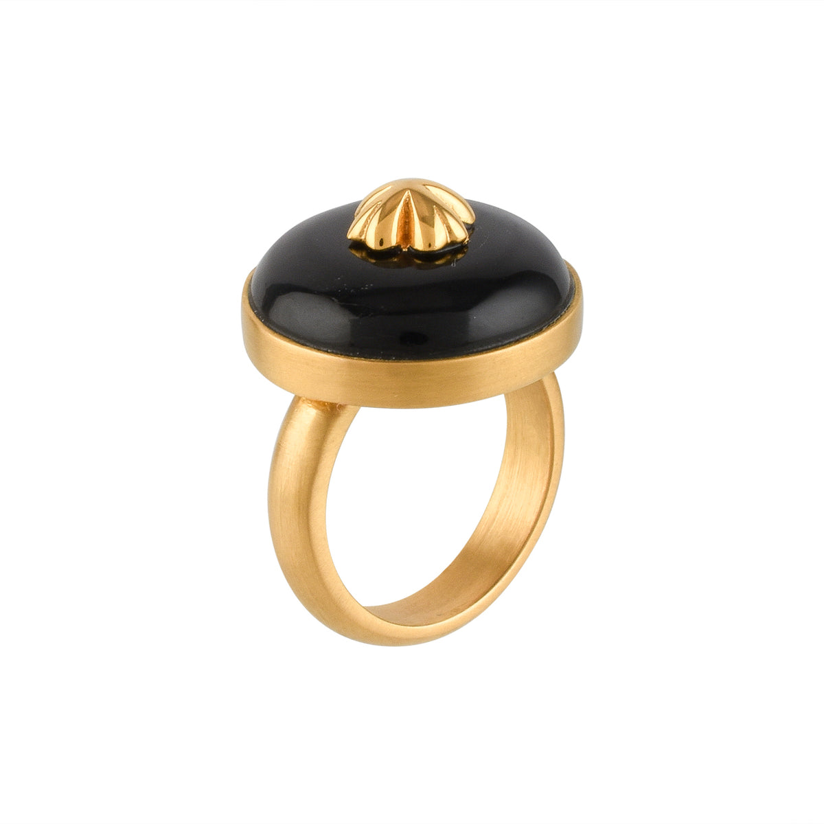 Gold ring with a black circular buffalo horn material and gold floral design on a white background