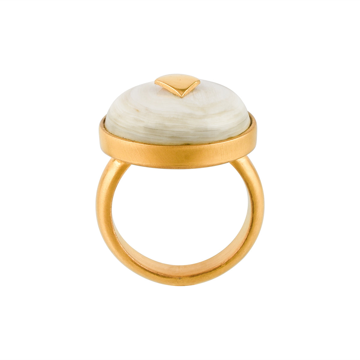 Gold ring with a white horn on a white background