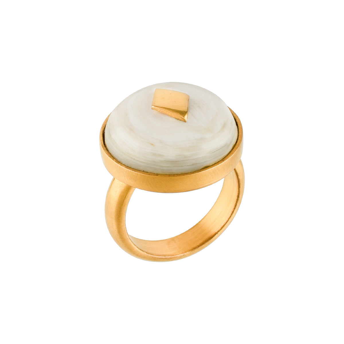 Gold ring with a white horn and gold accent on a white background
