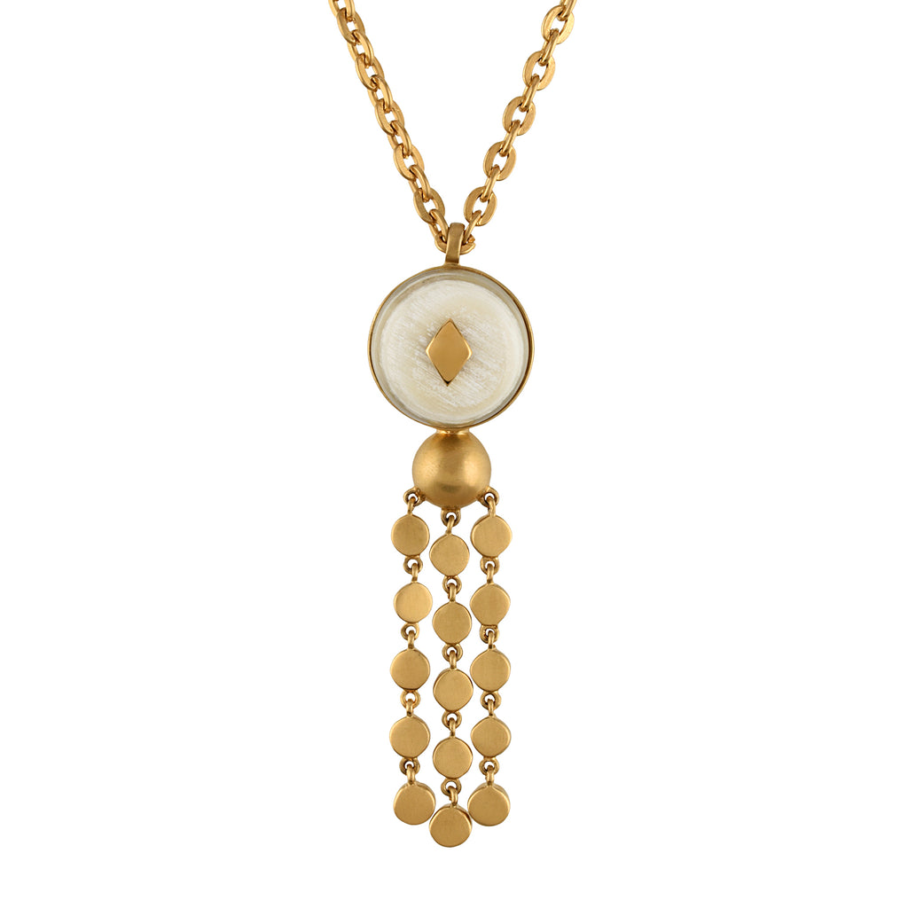 Gold necklace with a circular pendant and dangling beads on a white background