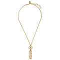 Gold necklace with a pendant on a white background.