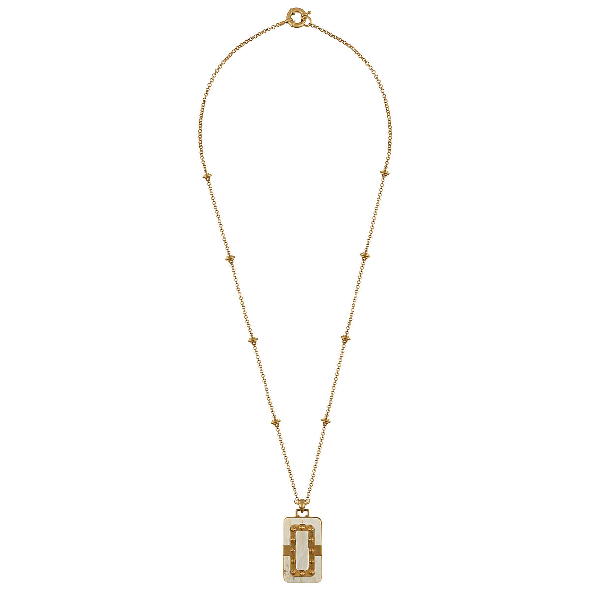 Gold necklace with a white pendant on a white background