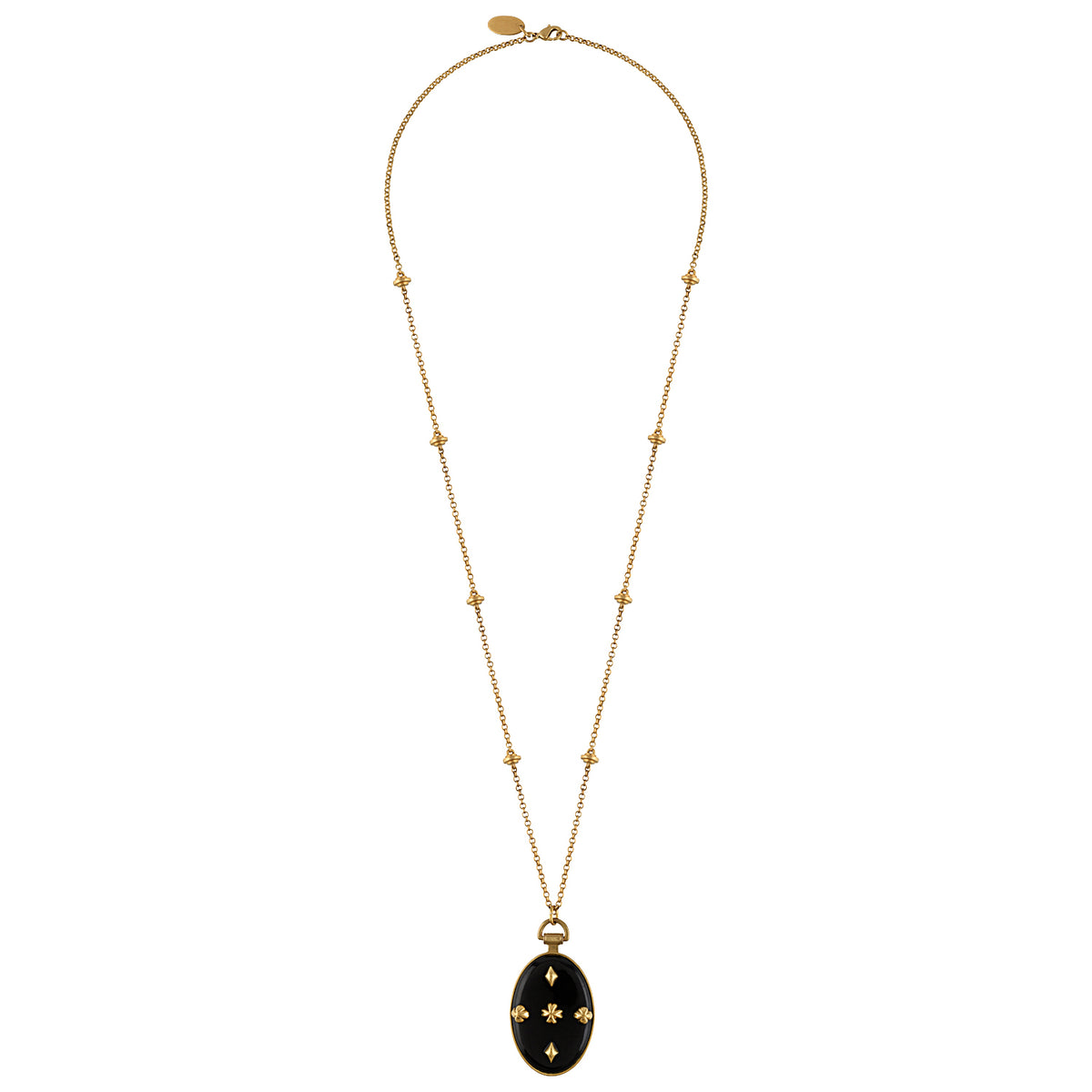 A gold chain necklace featuring a long drop pendant with a black oval inlay decorated with four gold stars, shown against a plain white background.