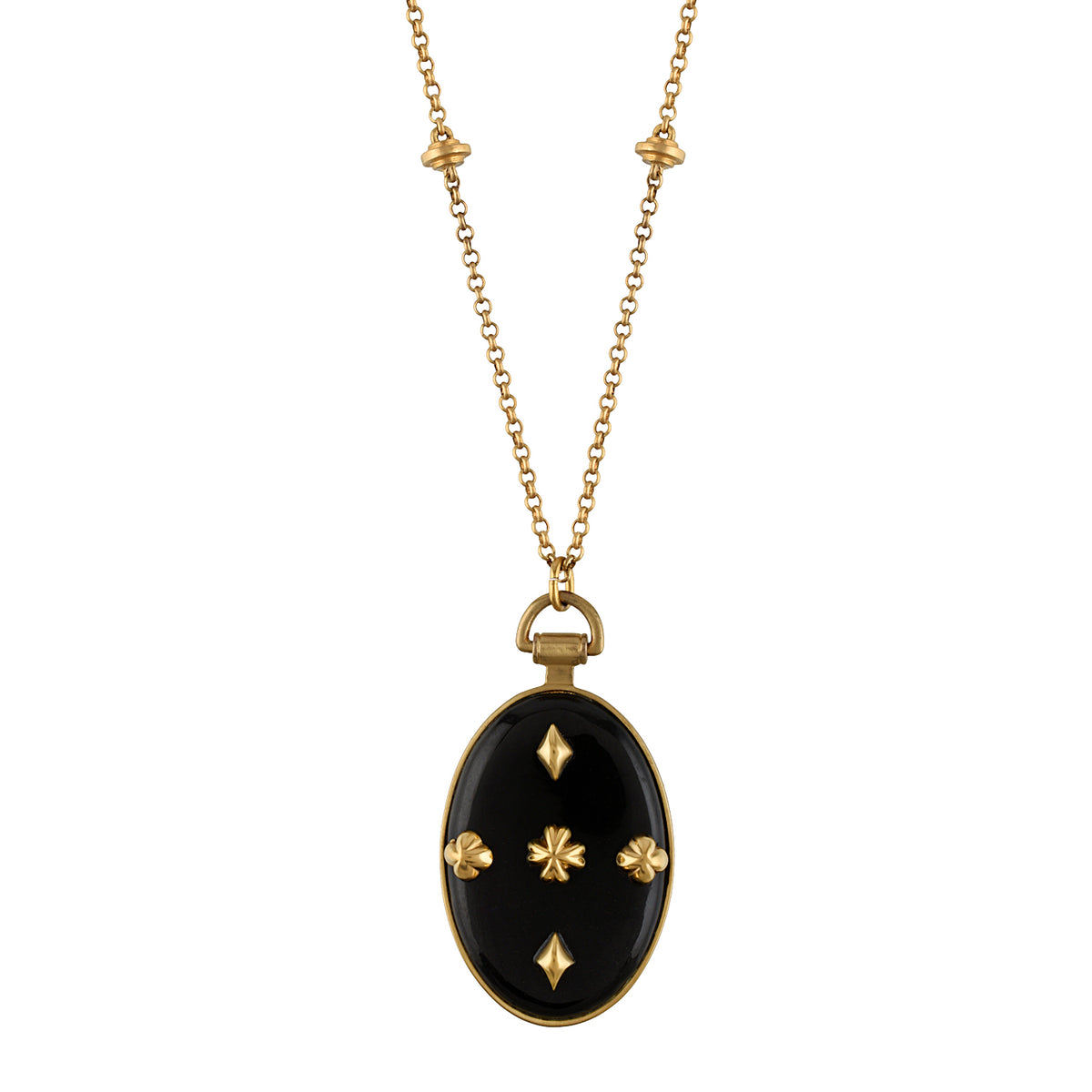 A gold chain necklace featuring a long drop pendant with a black oval inlay decorated with four gold stars, shown against a plain white background.