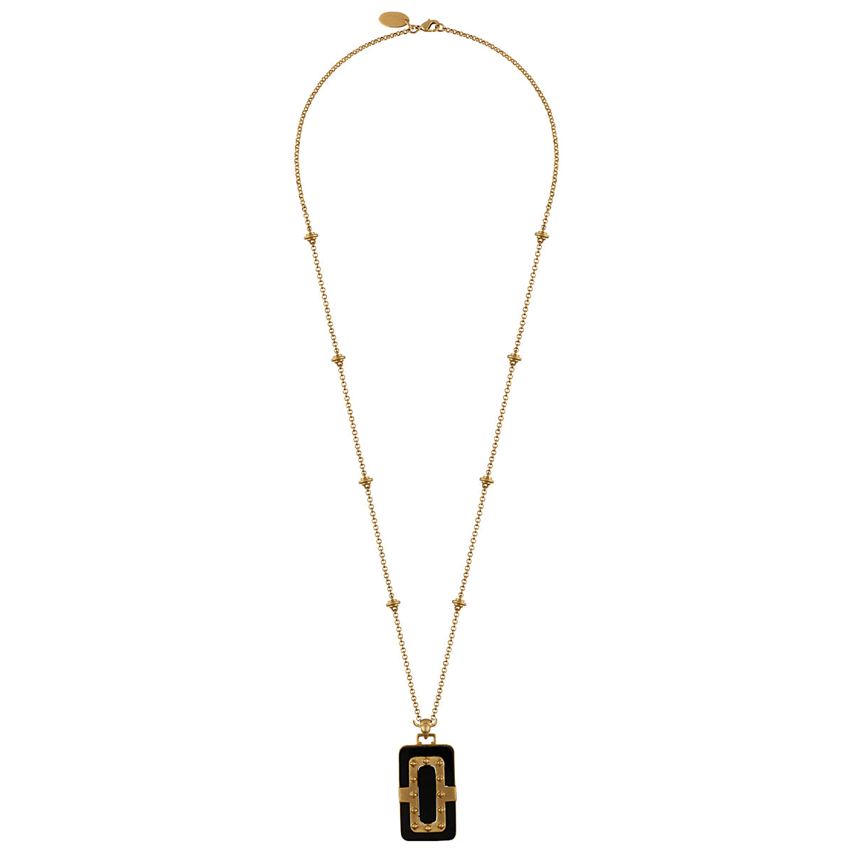Gold necklace with a black pendant on a white background
