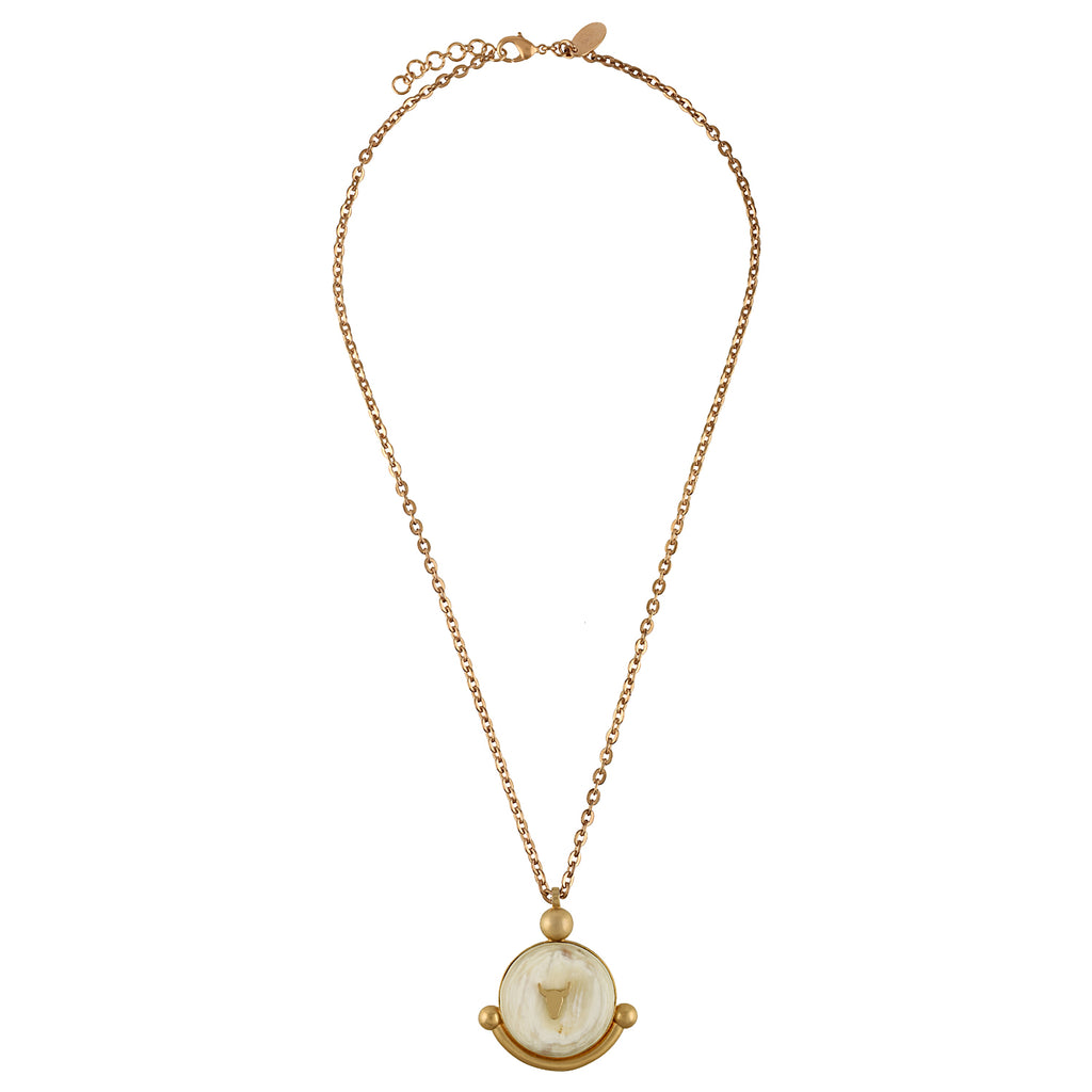 Gold chain with a pendant on a white background