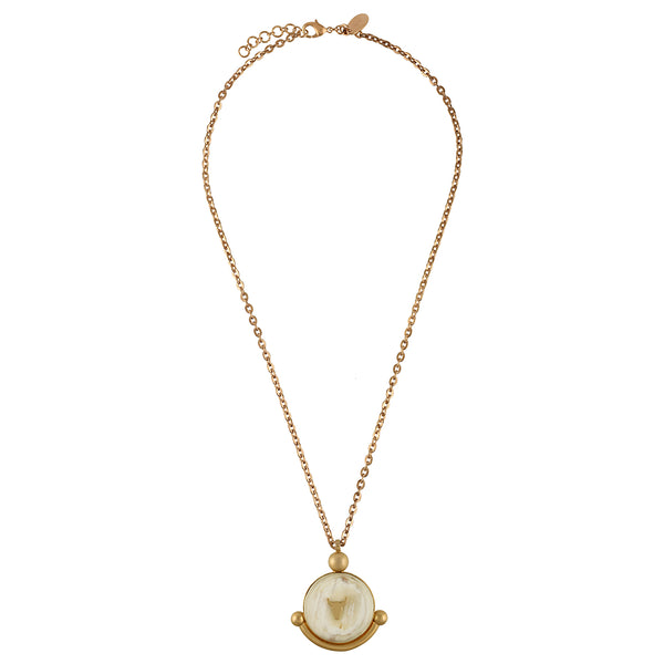 Gold chain with a pendant on a white background