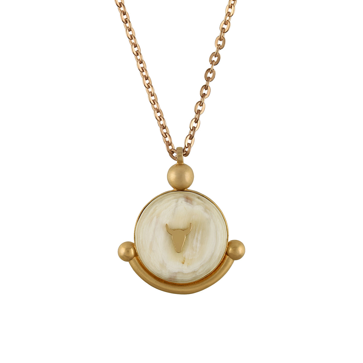 Gold chain with a circular pendant on a white background
