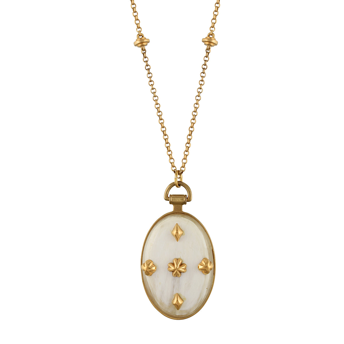 Gold necklace with an oval pendant featuring a white mother-of-pearl background and gold decorative accents, shown on a plain white background.